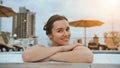 Girl after swimming posing in the pool. Royalty Free Stock Photo