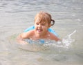 Girl swimming in river