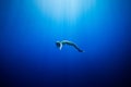 Girl swimming underwater