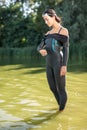 Girl in the swimrun suit outdoors Royalty Free Stock Photo