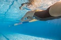 Girl swims in crawl style underwater Royalty Free Stock Photo