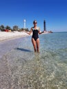 Girl in a swimsuit on Dzharylhach island beach