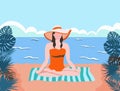 Girl in a swimsuit and a hat on the beach. Summer rest.