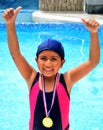 Girl in swimsuit with medals