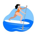 A girl in a swimsuit with a paddle stands on a surfboard.