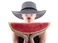 Girl in swimsuit with red watermelon in hand