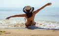 Girl on the beach reached. back view Royalty Free Stock Photo