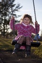 Girl on the swing Royalty Free Stock Photo