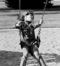 Girl On Swing Having Fun