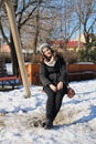 Girl on swing in winter