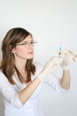 The girl with a syringe for injections