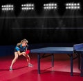 Girl table tennis player at sports hall Royalty Free Stock Photo