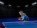 Girl table tennis player at sports hall Royalty Free Stock Photo