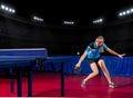 Girl table tennis player at sports hall Royalty Free Stock Photo