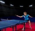 Girl table tennis player at sports hall Royalty Free Stock Photo