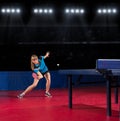 Girl table tennis player at sports hall Royalty Free Stock Photo