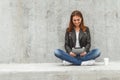 Girl with a tablet in hands