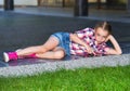 Girl with a tablet in the park