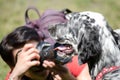 Girl take a picture of English setter Royalty Free Stock Photo