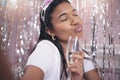 Girl take selfie with glass of champagne at party, event or festival. Black woman has sparkling wine in hand at birthday Royalty Free Stock Photo