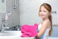 Girl taken towel in bathroom Royalty Free Stock Photo