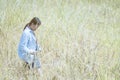 Girl takes photographs with vintage photo camera outdoor,Woman p Royalty Free Stock Photo