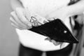 Girl is taking out fifty-euro banknote from her leather wallet Royalty Free Stock Photo