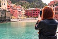 Girl is taking a photo of Vernazza village Royalty Free Stock Photo