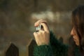 Girl taking photos in autumn fall Royalty Free Stock Photo