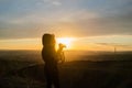 Girl Taking Photos During Colored Sunset In Quarry Hady Brno With View Inside City
