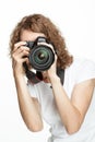 Girl taking a picture using digital camera Royalty Free Stock Photo