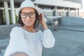 Girl taking selfie. Young happy woman