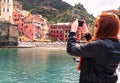 Girl is taking a video of Vernazza Royalty Free Stock Photo