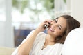 Girl talking on the mobile phone at home Royalty Free Stock Photo