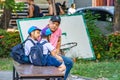 The girl talking with my father before school in the BangYai park.