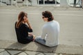 Girl talking on the phone while boyfriend is waiting Royalty Free Stock Photo