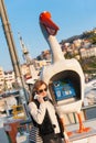 Girl Talking on Public Phone Royalty Free Stock Photo