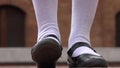Girl Tapping Her Foot Wearing White Socks