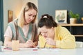 Girl And Teacher Painting Picture Royalty Free Stock Photo