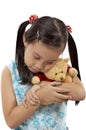 Girl with a teddy bear