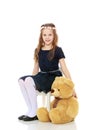 Girl with a Teddy bear. Royalty Free Stock Photo