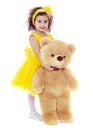 Girl with teddy bear Royalty Free Stock Photo