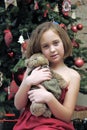 Girl with teddy bear in her hands Royalty Free Stock Photo