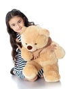 Girl with teddy bear Royalty Free Stock Photo