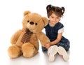 Girl with teddy bear Royalty Free Stock Photo