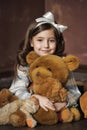 Girl with teddy bears Royalty Free Stock Photo