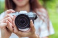 Girl teen hold mirrorless camera Royalty Free Stock Photo