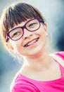 Girl. Teen. Pre teen. Girl with glasses. Girl with teeth braces. Young cute caucasian blond girl wearing teeth braces and glasses Royalty Free Stock Photo