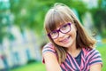 Girl. Teen. Pre teen. Girl with glasses. Girl with teeth braces. Young cute caucasian blond girl wearing teeth braces and glasses Royalty Free Stock Photo