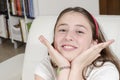 Girl teenage brunette is looking at camera with smile. Royalty Free Stock Photo